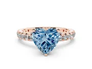 Fancy Blue Heart Cut Diamond Pavé Solitaire Ring Set in Rose gold with Round Band and Prong Setting