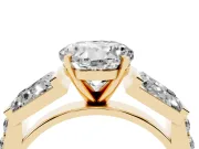 Round Cut Diamond Engagement Ring Set in Yellow gold with Baguette Side Stones and Channel Set Band