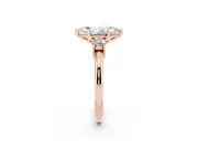 Three-Stone Marquise Cut Diamond Ring Set in Rose gold with Prong Setting and Plain Band