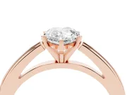 Pear Cut Diamond Solitaire Ring Set in Rose gold with Prong Setting and Classic Band