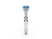 Fancy Blue Cushion Cut Diamond Solitaire Ring Set in White gold with Channel-Set Band and Prong Setting