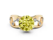 Fancy Yellow Round Cut Diamond Solitaire Ring Set in Yellow gold with Side Stones on Criss-Cross Band and Prong Setting