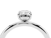 Emerald Cut Diamond Solitaire Ring Set in Platinum with Prong Setting on a Polished Plain Band