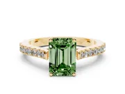 Fancy Green Emerald Cut Diamond Solitaire Engagement Ring Set in Yellow gold with Delicate Pavé Band and Prong Setting