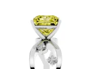 Fancy Yellow Princess Cut Diamond Solitaire Ring Set in Platinum with Side Stones on Criss-Cross Band and Prong Setting
