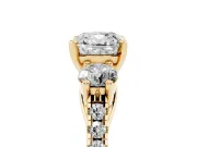 Three-Stone Cushion Cut Diamond Pavé Band Ring Set in Yellow gold with Prong-Set Trio