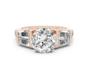 Round Cut Diamond Engagement Ring Set in Rose gold with Baguette Side Stones and Channel Set Band