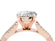 Heart Cut Diamond Solitaire Engagement Ring Set in Rose gold with Twisted Pavé Band and Prong Setting