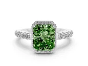 Fancy Green Radiant Cut Diamond Halo Engagement Ring Set in White gold with Pavé Band and Prong Setting