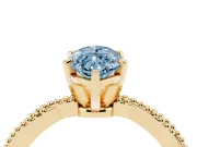 Fancy Blue Marquise Cut Diamond Solitaire Ring Set in Yellow gold with Twisted Band and Bead Prong Setting