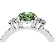 Fancy Green Oval Cut Diamond Three-Stone Ring Set in White gold with Pavé Band and Graduated Sides
