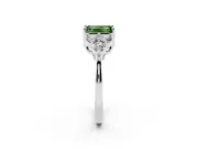 Fancy Green Emerald Cut Diamond Solitaire Ring Set in White gold with Cluster Accents on Each Side