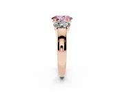 Fancy Pink Three-Stone Oval Cut Diamond Ring Set in Rose gold with Matching Prong Settings and Plain Band