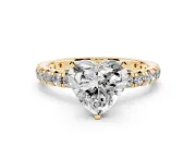 Heart Cut Diamond Pavé Solitaire Ring Set in Yellow gold with Round Band and Prong Setting