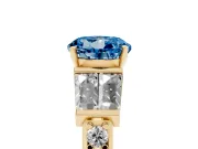 Fancy Blue Round Cut Diamond Engagement Ring Set in Yellow gold with Baguette Side Stones and Channel Set Band