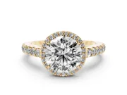 Round Cut Diamond Halo Engagement Ring Set in Yellow gold with Pavé Band and Prong Setting