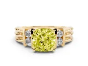 Fancy Yellow Three-Stone Cushion Cut Diamond Channel Set Ring Set in Yellow gold with Bar Prongs