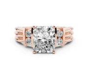 Three-Stone Radiant Cut Diamond Channel Set Ring Set in Rose gold with Bar Prongs