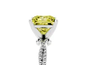 Fancy Yellow Princess Cut Diamond Solitaire Ring Set in White gold with Twisted Band and Bead Prong Setting