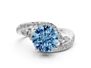 Fancy Blue Round Cut Diamond Solitaire Ring Set in White gold with Pavé Twist Band and Secure Prong Setting