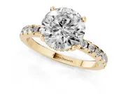 1.5 Carat Round Cut Pavé Solitaire Ring Set in Yellow gold with Round Band Accents and Prong Setting