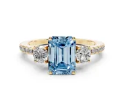 Emerald Cut Three Stone Engagement Ring Setting for a Fancy Blue Lab-Grown Diamond | Pave Shoulders | Yellow Gold