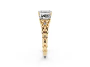 Emerald Cut Diamond Three-Stone Ring Set in Yellow gold with Braided Band