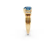 Fancy Blue Three-Stone Heart Cut Diamond Channel Set Ring Set in Yellow gold with Bar Prongs