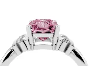 Fancy Pink Three-Stone Radiant Cut Diamond Channel Set Ring Set in Platinum with Bar Prongs
