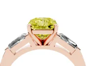 Fancy Yellow Radiant Cut Diamond Solitaire Ring Set in Rose gold with Tapered Baguette Side Stones and Prong Setting
