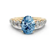 Oval Graduated Side Stone Engagement Ring Setting for a Fancy Blue Lab-Grown Diamond | Flat Top Band | Yellow Gold