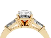 Emerald Cut Diamond Solitaire Ring Set in Yellow gold with Tapered Baguette Accents and Prong Setting