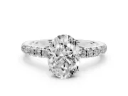 Oval Cut Diamond Pavé Solitaire Engagement Ring Set in Silver with Prong Setting