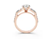 Round Cut Diamond Engagement Ring Set in Rose gold with Baguette Side Stones and Channel Set Band
