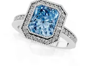 Fancy Blue Radiant Cut Diamond Halo Engagement Ring Set in Platinum with Pavé Band and Round Halo Stones