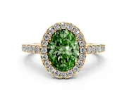 Fancy Green Oval Cut Diamond Halo Pavé Solitaire Ring Set in Yellow gold with Prong-Set Center Stone