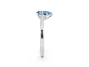 Fancy Blue Pear Cut Diamond Solitaire Ring Set in Silver with Cathedral Band and Prong Setting