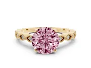 Fancy Pink Round Cut Diamond Solitaire Ring Set in Yellow gold with Infinity Twist Pavé Band