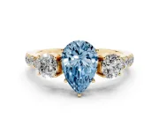 Pear-Shaped Engagement Ring Setting for a Fancy Blue Lab-Grown Diamond | Three Stone | Yellow Gold