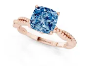 Fancy Blue Cushion Cut Diamond Solitaire Ring Set in Rose gold with Twisted Band and Bead Prong Setting