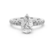 Pear Cut Diamond Pavé Solitaire Ring Set in Platinum with Round Band and Prong Setting
