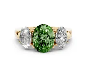 Fancy Green Oval Cut Diamond Three-Stone Ring Set in Yellow gold with Bold Center and Classic Band