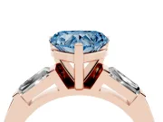 Heart-Shaped Three Stone Engagement Ring Setting for a Fancy Blue Lab-Grown Diamond | Tapered Baguettes | Rose Gold