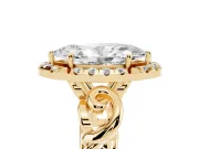 Marquise Cut Diamond Halo Ring Set in Yellow gold with Scrollwork Band and Prong Setting
