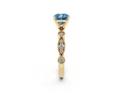 Fancy Blue Cushion Cut Diamond Solitaire Engagement Ring Set in Yellow gold with Milgrain Bezel Accent Band