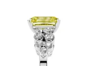 Fancy Yellow Emerald Cut Diamond Cluster Engagement Ring Set in Platinum with Pavé Band and Prong Setting
