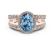 Fancy Blue Oval Cut Diamond Halo Ring Set in Rose gold with Pavé Split Shank and Prong Setting