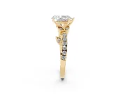 Pear Cut Diamond Solitaire Leaf-Inspired Ring Set in Yellow gold with Pavé Band and Prong Setting