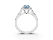 Fancy Blue Oval Cut Diamond Halo Ring Set in White gold with Pavé Band and Raised Center Setting