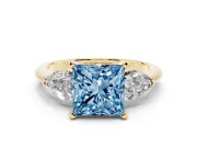 Princess Cut 3-Stone Engagement Ring Setting for a Fancy Blue Lab-Grown Diamond | Yellow Gold
